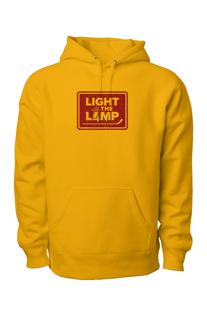 Light the Lamp Badge Legend Heavyweight Hoodie Gold | Barn Garb Hockey Threads